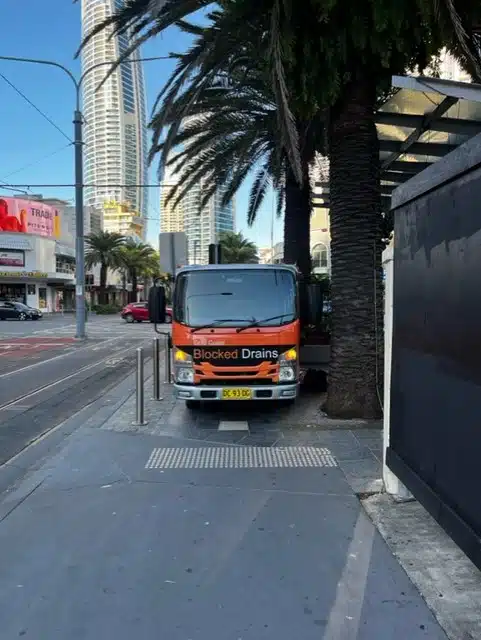 front of gold coast blocked drains truck in surfers paradise gold coast