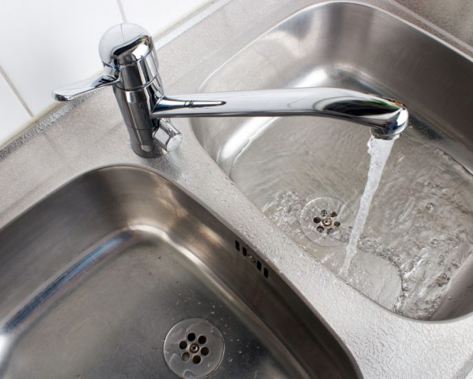 Water flowing from the faucet — Blocked Drain Services In Nerang, QLD