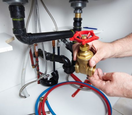 Plumber handling faucet — Blocked Drain Services In Coolangatta, QLD